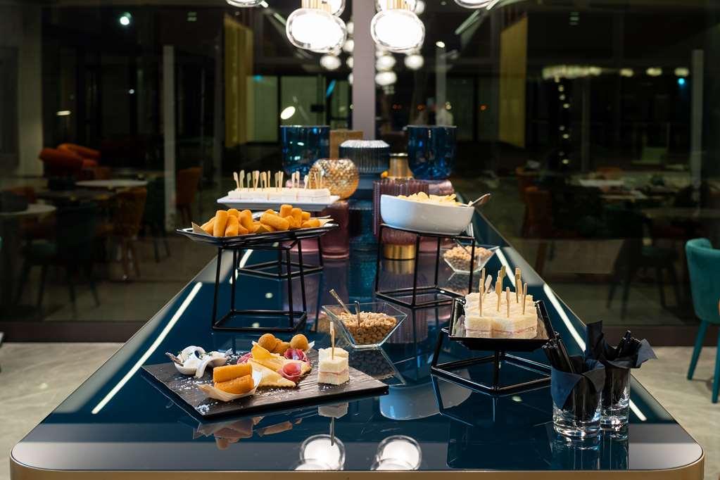 מלון Doubletree By Hilton Milan Malpensa Solbiate Olona מסעדה תמונה